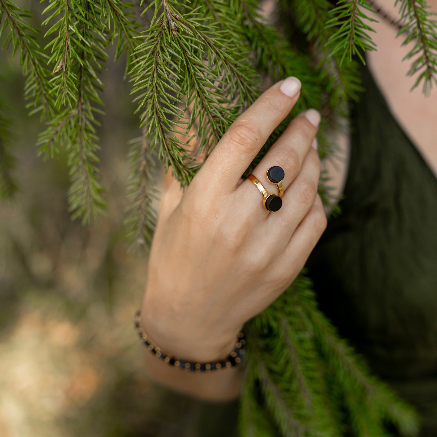 Gold-plated silver double ring with black Baltic amber