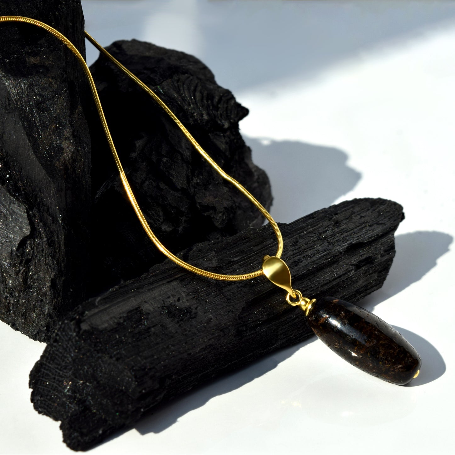 Beautiful Shiny Black Baltic Amber Pendant