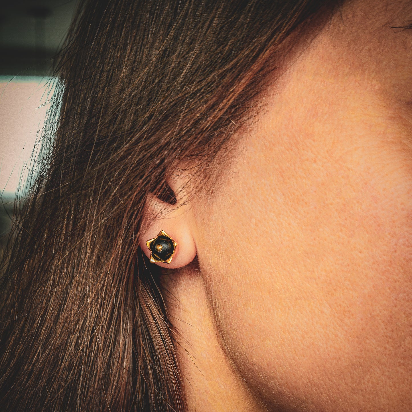 Beautifully designed flower stud earrings with Baltic Amber