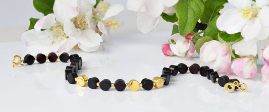 Baltic amber jewelry in natural light – Forest Pearls collection