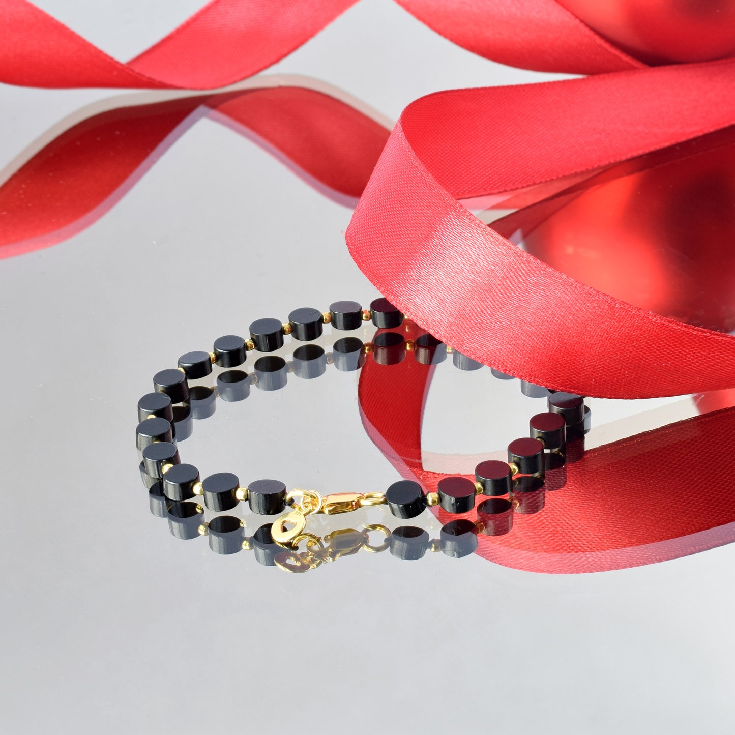 Black Amber Tablet Beads Bracelet: Stylish Soft Elegance