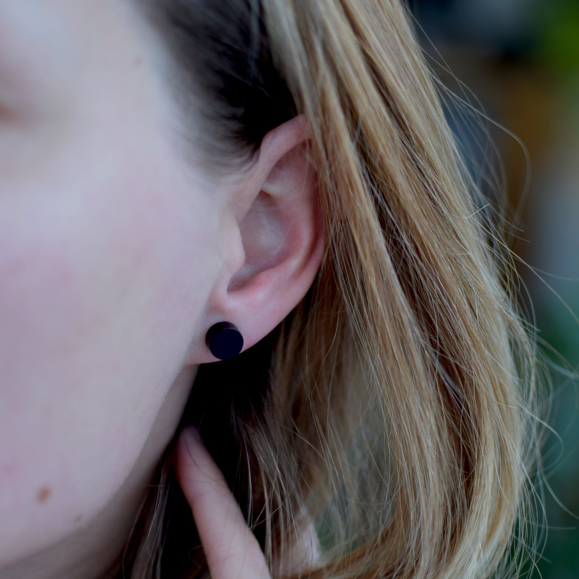 black baltic amber stud earrings gold plated detail